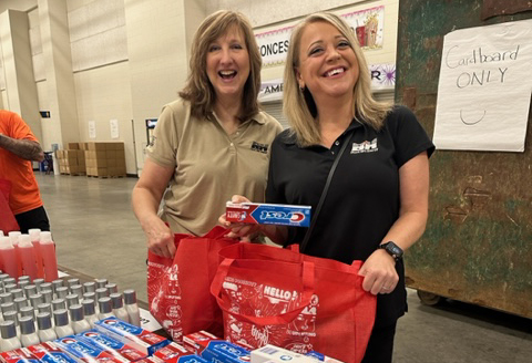 women packing toothpaste into bags